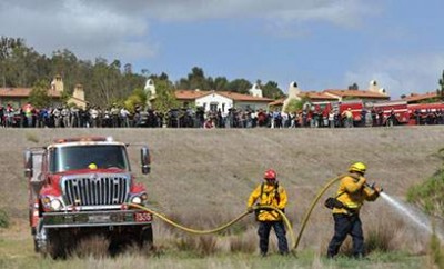 OCFA firefighters performing a demonstration for the assembled media at Wednesday’s press conference.  Photo courtesy of the OCFA.